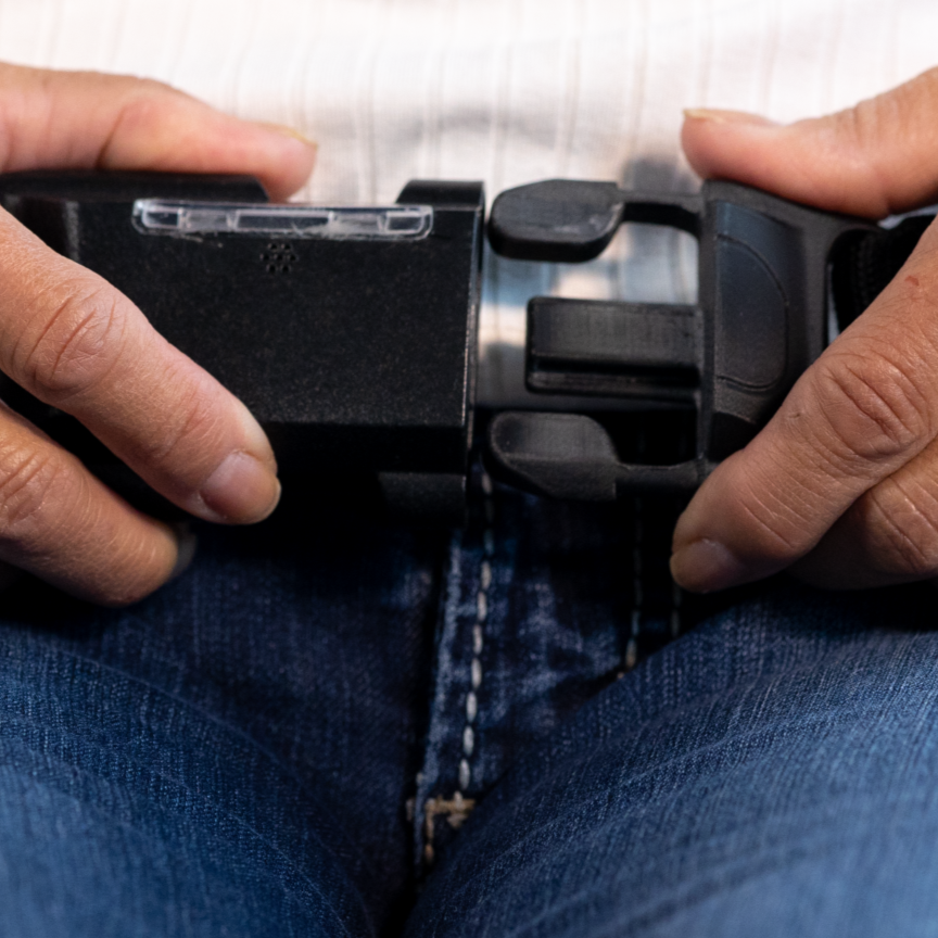 Close up of buckling the Smart Hip Guardian belt